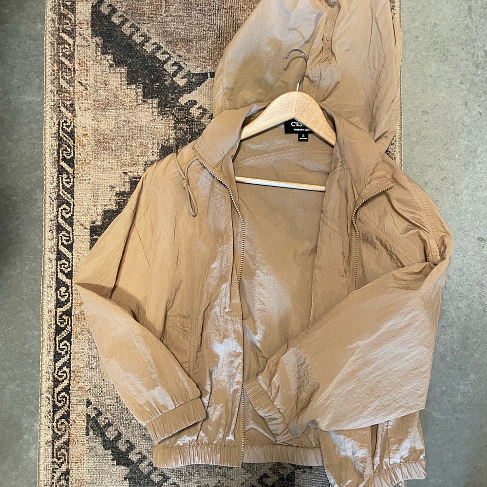 Tan raincoat size small